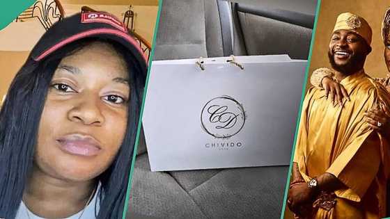 Chivido24: Lady cries out after seeing Davido's fake wedding invitation card selling for over N50k
