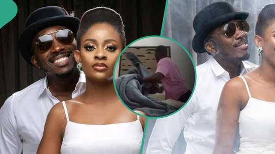Sweet moment as comedian Bovi catches his wife, Kris, trying to give him a surprise visit from London