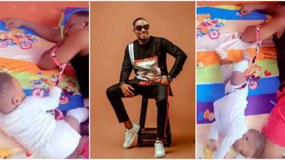 Pikin wey say him papa no go sleep: Fans react as actor Junior Pope shares remarkable way he babysits son