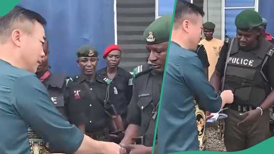Chinese seen giving policemen money in viral video apologises, “It’s a common tradition”