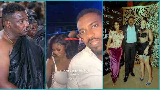 John Dumelo "chills" in Abuja club with Salma Mumin, others weeks after mum's death, fans bash him