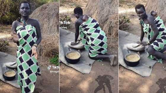 "Her skin is glowing": Pretty black mum bends down to use grinding stone with baby strapped to her back