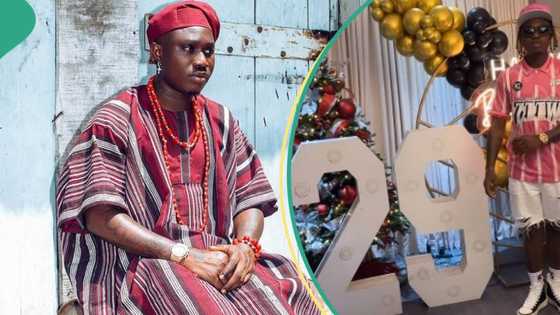 Zlatan Ibile marks 29th birthday, drinks to his new age in a decorated room, cake spotted in video