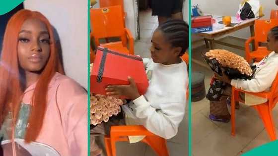 Nigerian lady reacts after unboxing birthday package to see unexpected items inside, video trends