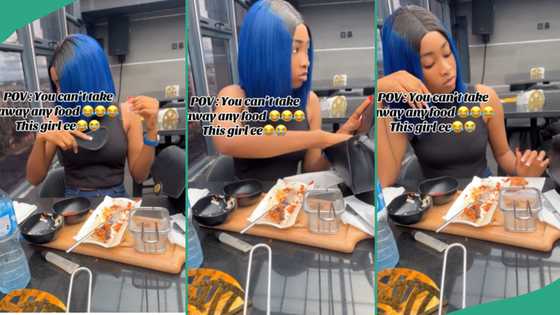 Video of beautiful lady in eatery stylishly putting her chicken into her handbag amuses Nigerians