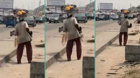 "Let us help this man": Lady begs Nigerians after seeing elderly hawker's walking step on the road