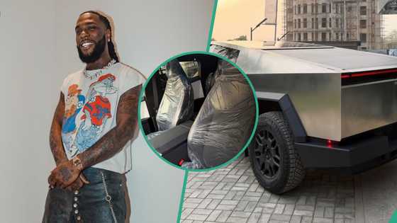 Burna Boy throws shade as he buys Tesla cyber truck for King Manny: "OBO is air they breathe"