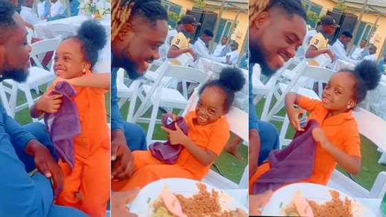 "Mummy are you jealous?" Funny little girl teases her mum as she plays with dad at an event