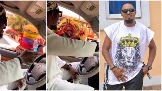 “Because of money the god showed his face”: Funny reactions trail video of Junior Pope and a masquerade