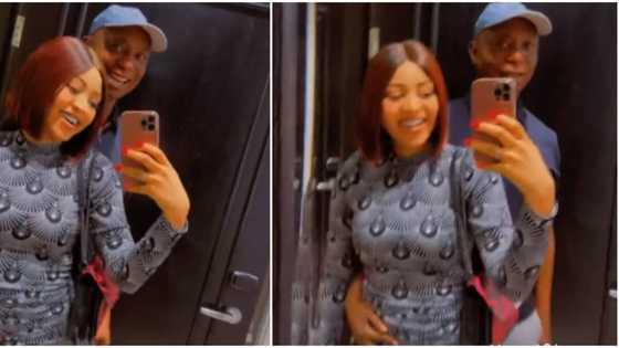 Regina Daniels blushes as Ned Nwoko wraps hand around her waist, draws her closer to him in loved-up video