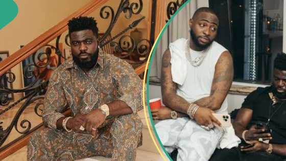 “Davido not reacting says a lot”: Uproar as OBO’s aide assaults fan for trying to get a pics in clip