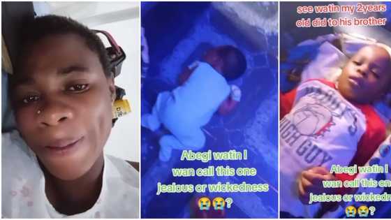 Nigerian mum catches jealous 2-year-old son dealing with her baby, shares video online as she cries out