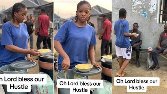 "This girl too fine": Pretty Nigerian girl selling akara and pap by roadside trends, netizens praise her
