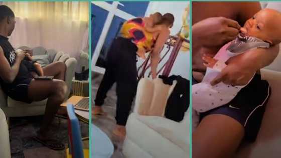 "He married a lazy wife": Nigerian ban bathes and backs his little child in video, people react