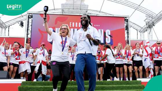 Burna Boy surprises England manager Sarina Wiegman during Euro 2025 victory parade, video