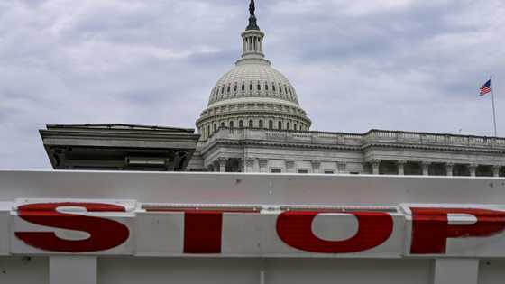 Asian stocks mixed, Wall St futures drop as US heads for shutdown