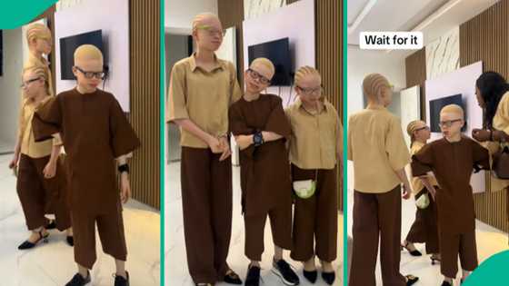 Nigerian mum who gave birth to 3 albino kids proudly shows them off in video: "I love you guys"