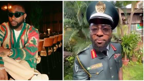 Davido dons military uniform for drink commercial amid pregnancy scandal: "Father Abraham of our time"