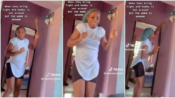 "Wait for your husband to return": Scared Nigerian lady shakes while pushing change over switch in video