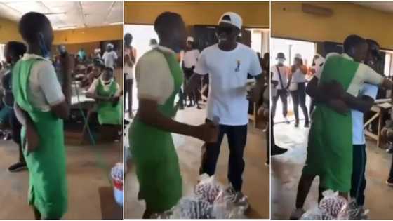 Female student jumps up in excitement, hugs Reekado Banks as he visits her school, video warms hearts