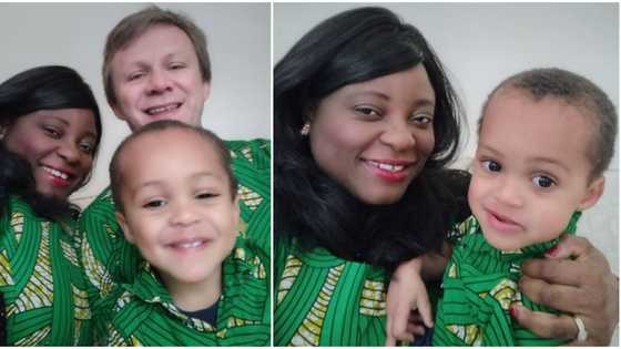Social media users gush as Nigerian lady, her white hubby and son storm England birthday party in native wears