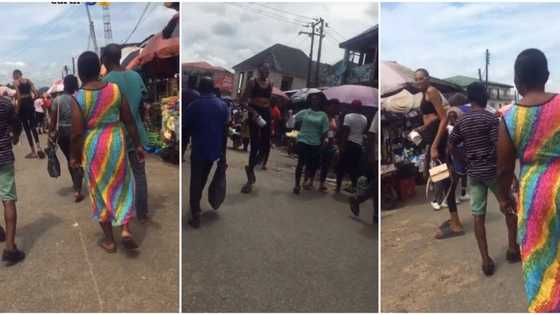 "Cameraman dey fear to video": Clip of very tall woman spotted in Nigerian market stuns people