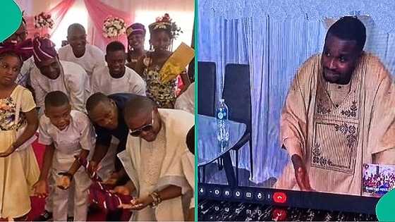 Nigerian couple living abroad holds virtual wedding through projector, video goes viral