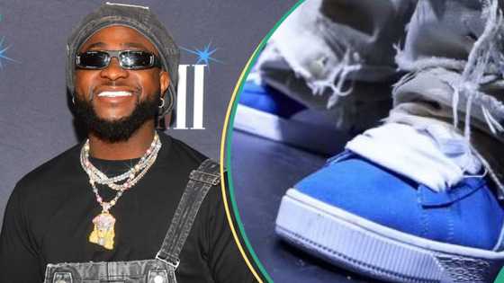 "Big in supporting others": Davido receives shoe made by fan, wears them for show, clip trends