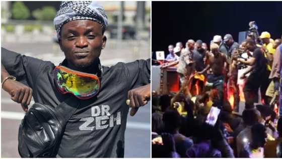 "The shoe go dey smell": Many react as Portable gives out shoes to lucky fan while performing on stage
