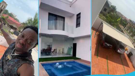 Michael Blackson flaunts huge house he built in Ghana, video shows numerous cars on compound: "Baba"