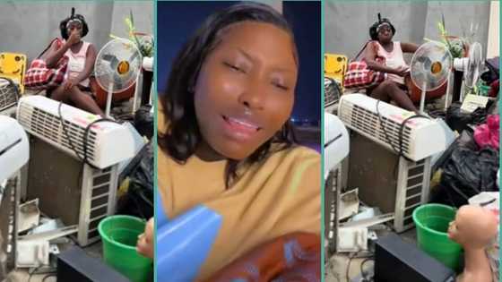 Nigerian lady refuses to beg landlord who chased her out, sits outside with properties, video trends