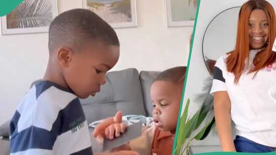 Nigerian mum of 3 gets her kids’ British passports after 5 years, celebrates with dance and toast