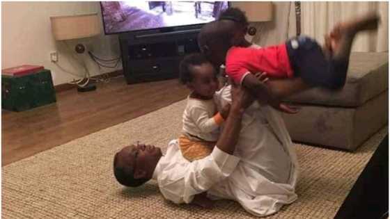 Incredible fitness: APC governor goes acrobatic with grandchildren during parlour play, photos wow Nigerians