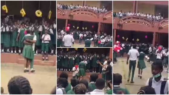 Secondary school students show love, boy kneels for girl in viral video as they hug, Nigerians react
