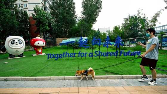 Xi's 'Chinese Dream' flickers in one Beijing neighbourhood