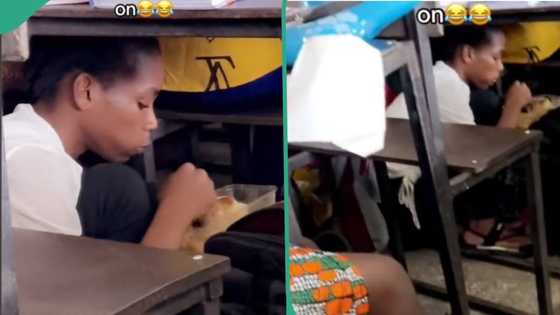 "Why is she hiding like that?" Female student hides under desk to eat, gets caught in video