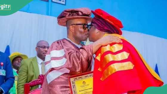 Akpabio romantically kisses wife, holds her tight as she receives honorary doctorate