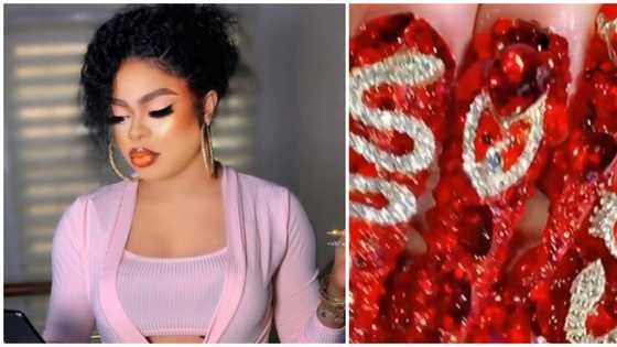 Crossdresser Bobrisky shows off his long Valentine nails, Nigerians react
