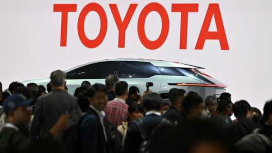 Toyota hikes annual forecast as first-half net profit doubles