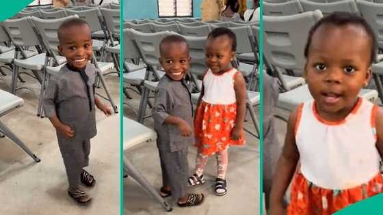 Little boy plays with girl inside church, cute video melts hearts on TikTok: "He has found love"