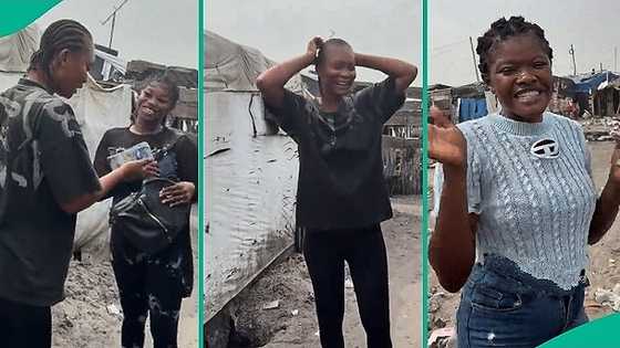Lady walks around neighbourhood sharing N2 million amongst needy people, video melts hearts