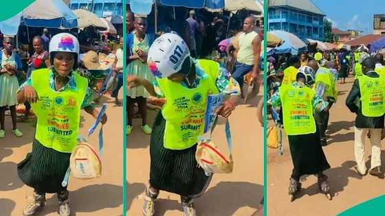 Lady in skating shoes joins Lord's Chosen members to evangelise at market, funny video goes viral