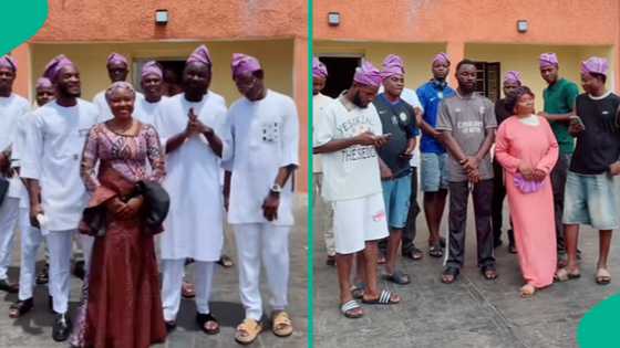 Nigerian lady who's only female child in family of 10 poses with brothers in video: "Full squad"