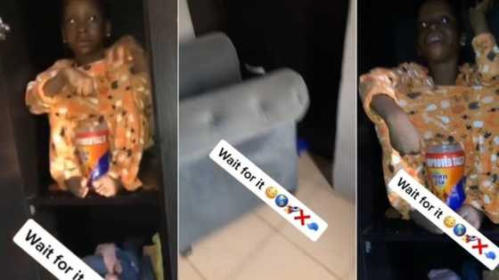 Nigerian father screams as he catches his daughter red-handed licking Bournvita inside a wardrobe
