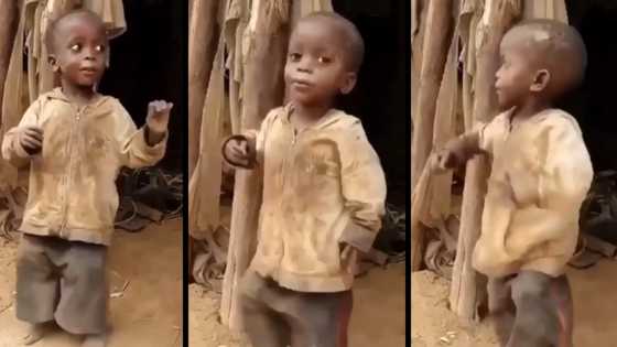 Cute little boy in big dirty shorts shows off unique legwork as he dances, video melts hearts on social media