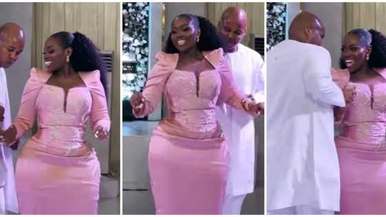 Curvaceous ebony bride rocks stylish pink dress for her special day, wows fashion lovers