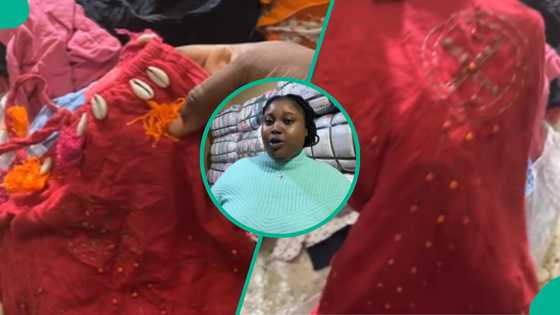 Okrika seller finds strange red cloth with cowries in bale, video trends