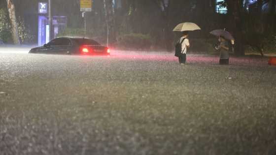 Record rainfall, flooding in Seoul kill seven
