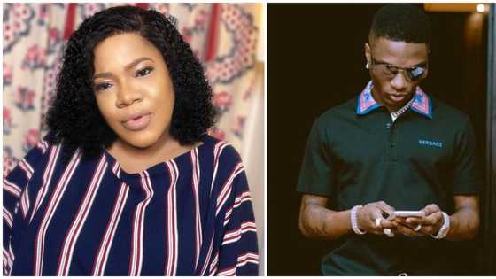 Actress Toyin Abraham star struck after running into Wizkid at an event, showers him with kisses on the cheek (video)