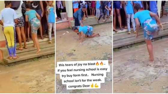 "Na she know her story": Video of cute lady crying inside rain after finishing nursing school sparks reactions